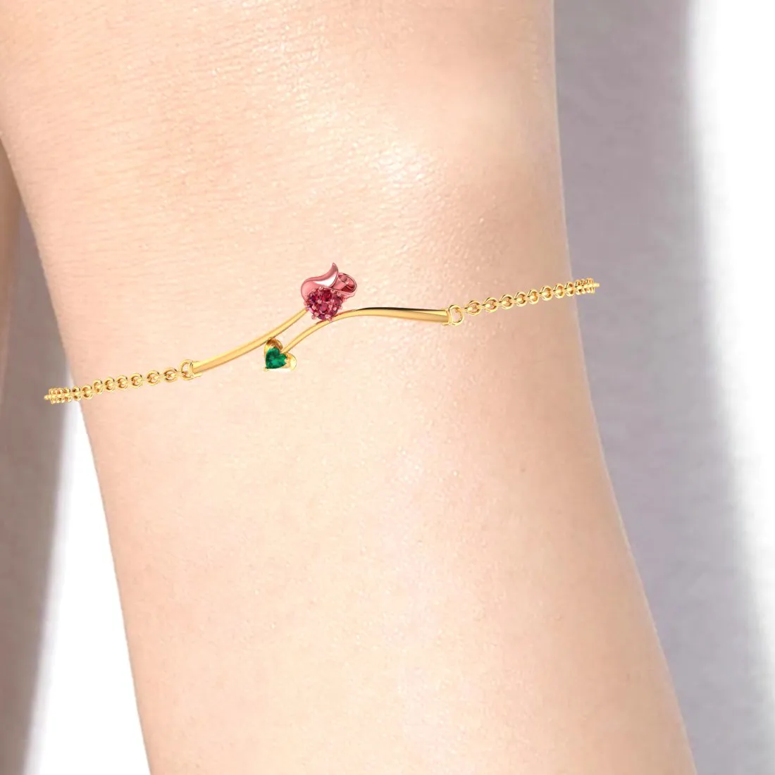 14k Gold Bracelet With A Yellow Shaped Design And A Green Stone